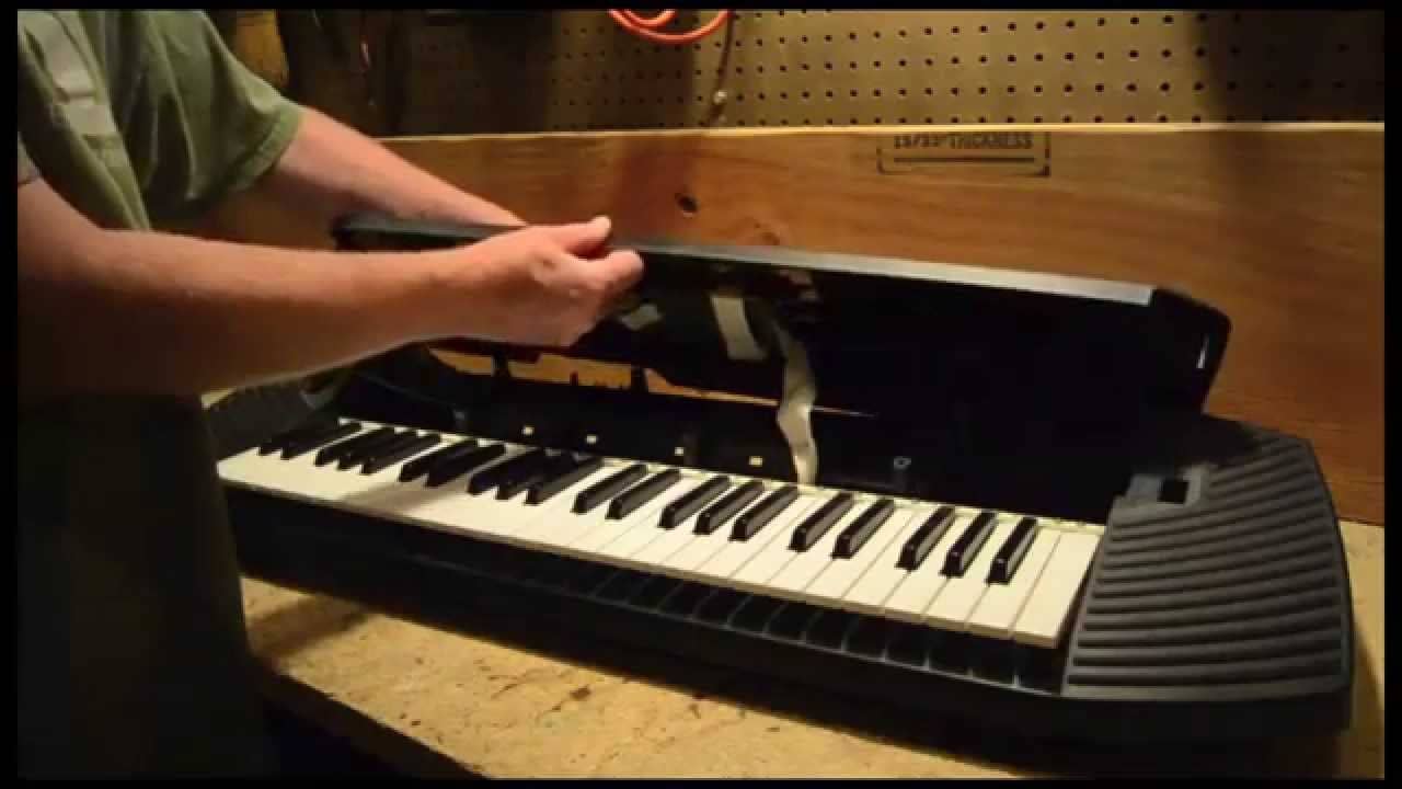 Lift the cover Yamaha keyboard